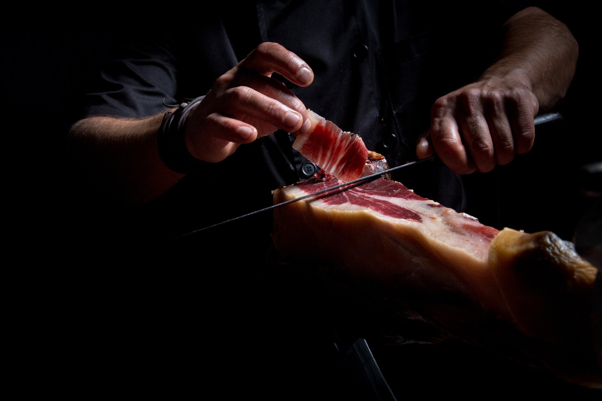 Taglio del prosciutto a mano